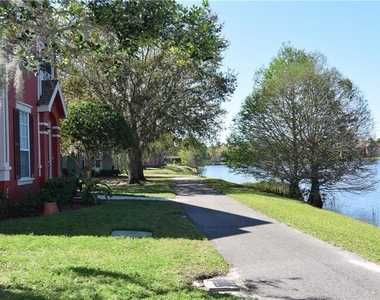 9640 Lake Chase Island Way - Photo Thumbnail 2
