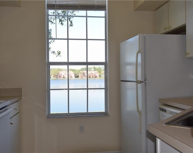 9640 Lake Chase Island Way - Photo Thumbnail 10