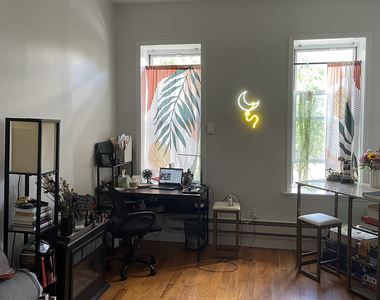 828 Halsey St - Photo Thumbnail 2