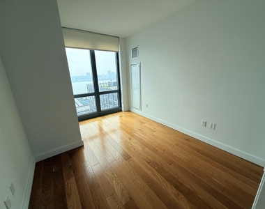 57th St & 11th Ave - Photo Thumbnail 1