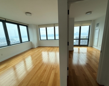 57th St & 11th Ave - Photo Thumbnail 1