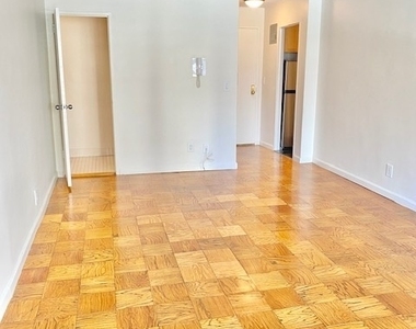 East 36 Street - Photo Thumbnail 2