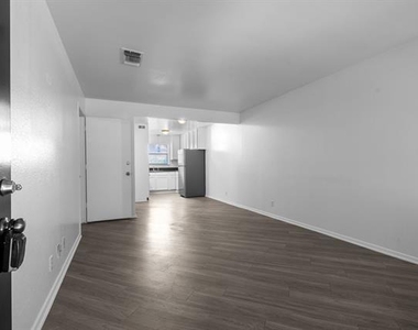 320 E 4th Street - Photo Thumbnail 1