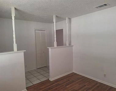 6005 Barry Drive - Photo Thumbnail 5