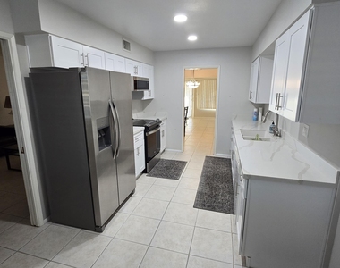 10715 W Tropicana Circle - Photo Thumbnail 2