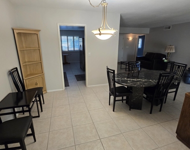 10715 W Tropicana Circle - Photo Thumbnail 10