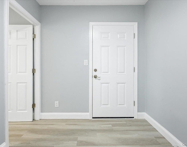 108-42 64th Avenue - Photo Thumbnail 1