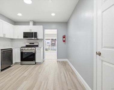 108-42 64th Avenue - Photo Thumbnail 3