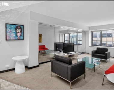 210 E 47th Street - Photo Thumbnail 3