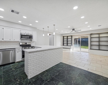 1703 Raintree Street - Photo Thumbnail 5