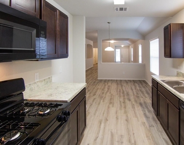 6303 Austinville Lane - Photo Thumbnail 2