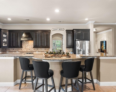 9614 Blackberry Terrace Drive - Photo Thumbnail 2