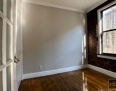 E 13th St. - Photo Thumbnail 2