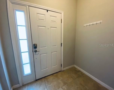 6842 40th Lane N - Photo Thumbnail 1