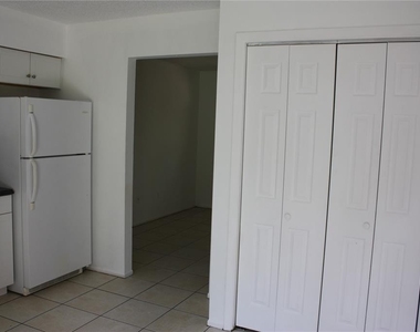 7965 W Fern Place - Photo Thumbnail 4