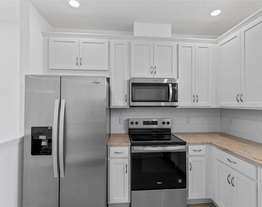 9711 Undset Alley - Photo Thumbnail 4