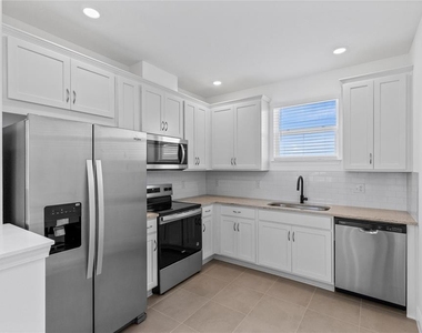 9711 Undset Alley - Photo Thumbnail 3