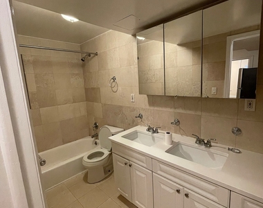 East 84 Street - Photo Thumbnail 2