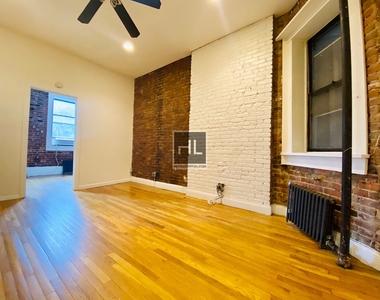 E 3rd St - Photo Thumbnail 2