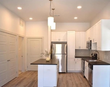 1514 E 15th Street - Photo Thumbnail 4