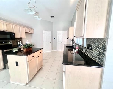 10718 Brandenberg Drive - Photo Thumbnail 10