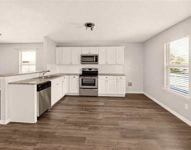 8704 Swan Park Drive - Photo Thumbnail 7