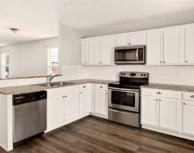 8704 Swan Park Drive - Photo Thumbnail 8