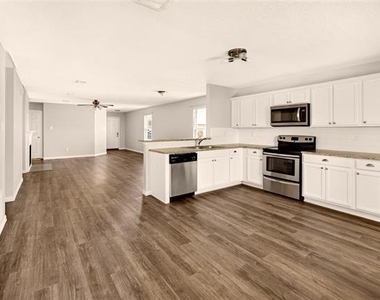 8704 Swan Park Drive - Photo Thumbnail 6