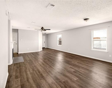 8704 Swan Park Drive - Photo Thumbnail 2