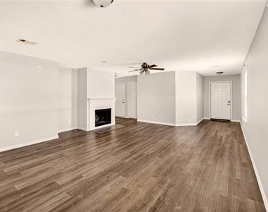 8704 Swan Park Drive - Photo Thumbnail 3