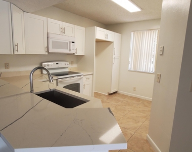 8851 Wiles Road - Photo Thumbnail 6