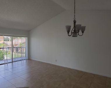 8851 Wiles Road - Photo Thumbnail 7