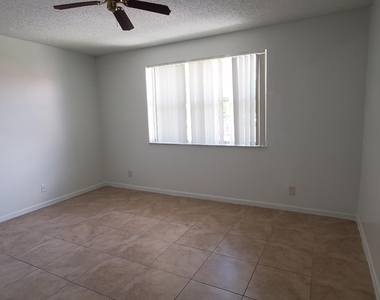 8851 Wiles Road - Photo Thumbnail 8