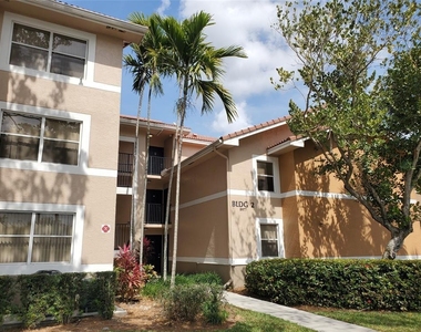 8851 Wiles Road - Photo Thumbnail 1