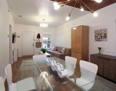 5411 Hudson St - Photo Thumbnail 4