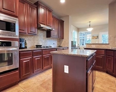 7908 Menler Dr - Photo Thumbnail 3