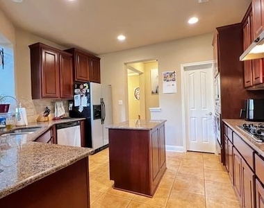 7908 Menler Dr - Photo Thumbnail 5