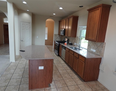 3230 Raintree Village Drive - Photo Thumbnail 3