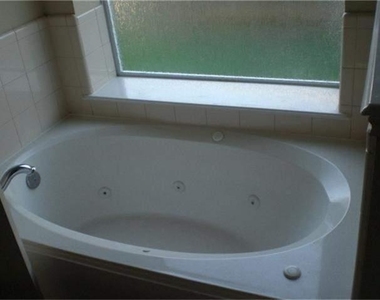 3230 Raintree Village Drive - Photo Thumbnail 3
