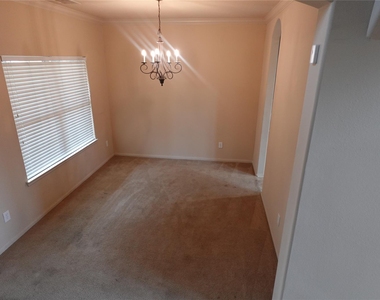 3230 Raintree Village Drive - Photo Thumbnail 1