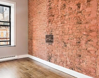 E 6th St. - Photo Thumbnail 4