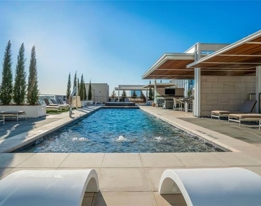 7901 Windrose Avenue - Photo Thumbnail 11