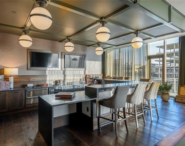 7901 Windrose Avenue - Photo Thumbnail 3