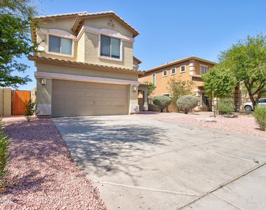 9928 W Chipman Road - Photo Thumbnail 2