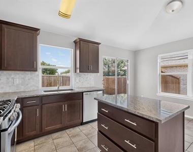 9012 Boone Drive - Photo Thumbnail 9