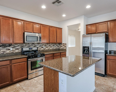 12039 W Leather Lane - Photo Thumbnail 12