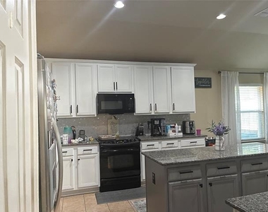 9223 Wild River Drive - Photo Thumbnail 2