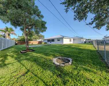 651 Se Degan Drive - Photo Thumbnail 27