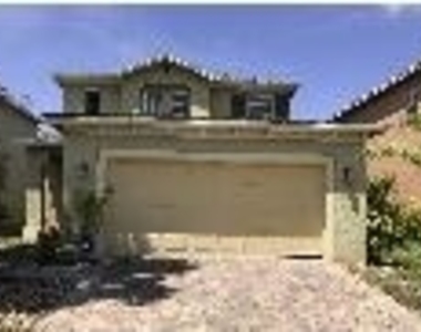 9322 Treasure Coast Street - Photo Thumbnail 1