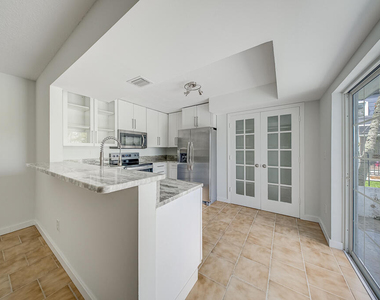 12037 Basin Street N - Photo Thumbnail 8